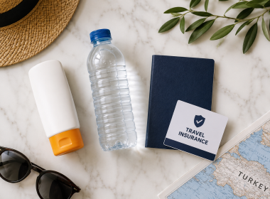 Travel health essentials for visiting Turkey including sunscreen, bottled water and travel insurance